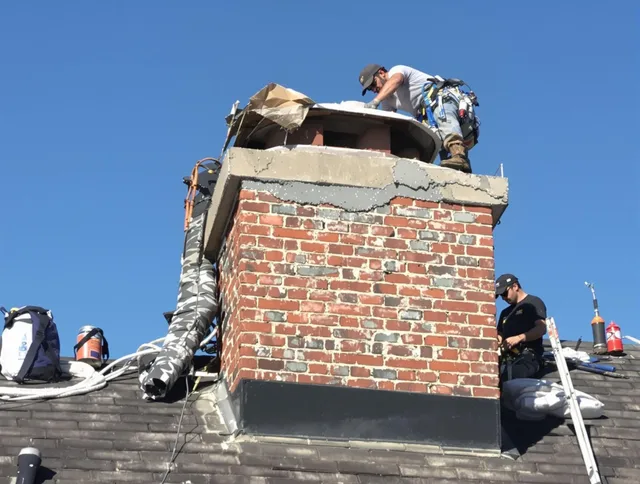 Lakeland Chimney Sweep installing a custom chimney crown in Lakeland, FL